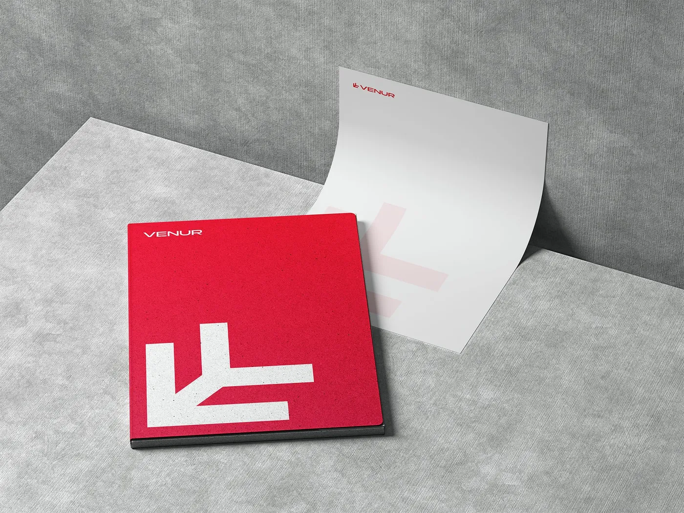 venur, carpeta y papel con membrete